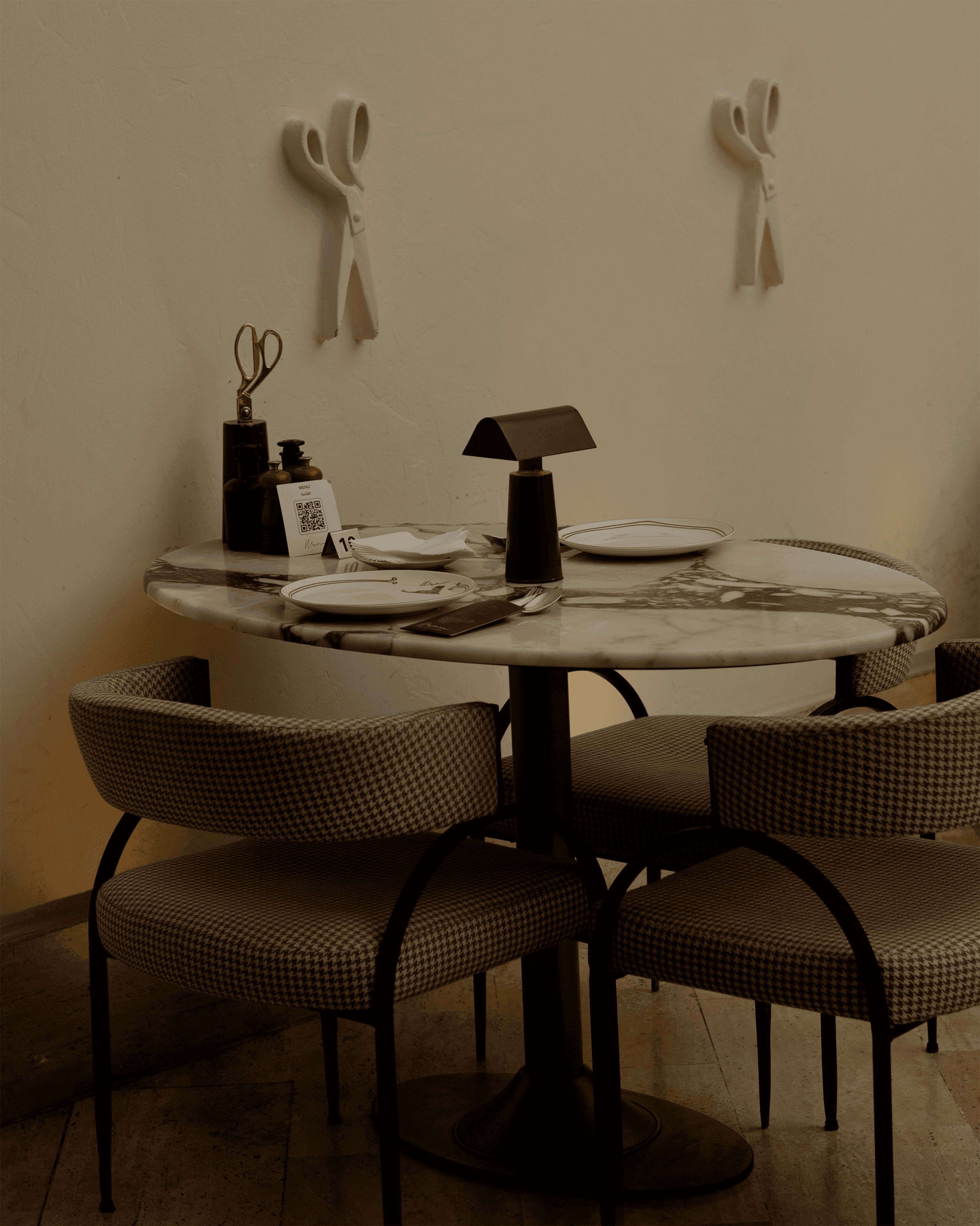 Elegant table setting inside the MEMOS dining room
